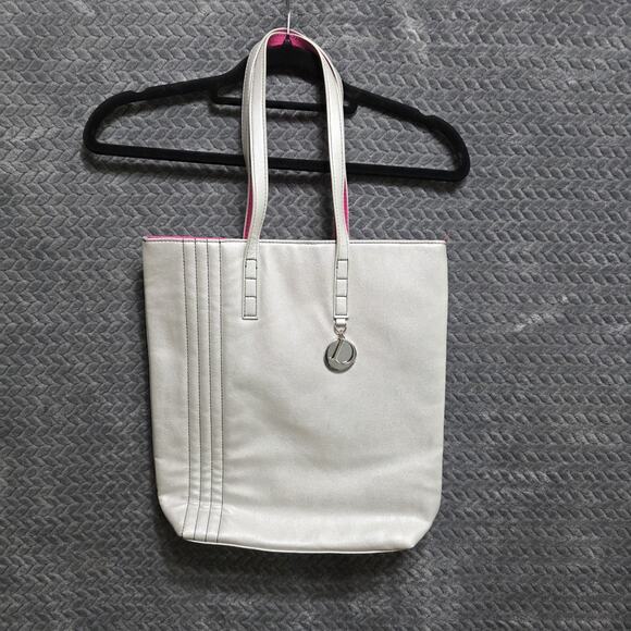 other Handbags - Dillard’s Metallic Silver Tote Bag Pink Lining Shoulder Shopper Purse